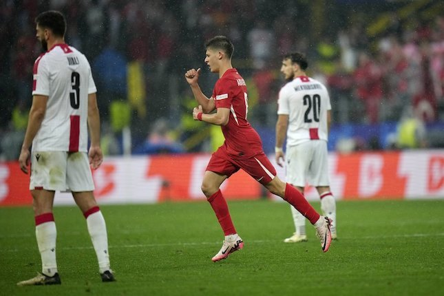 Arda Guler merayakan golnya di laga Euro 2024 antara Turki vs Georgia di Signal Iduna Park, Selasa (18/6/2024). (c) AP Photo/Alessandro Tarantino